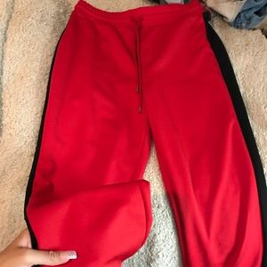 red & black track pants